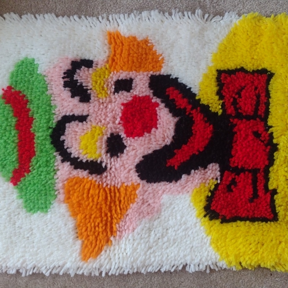 Completed latch hook clown